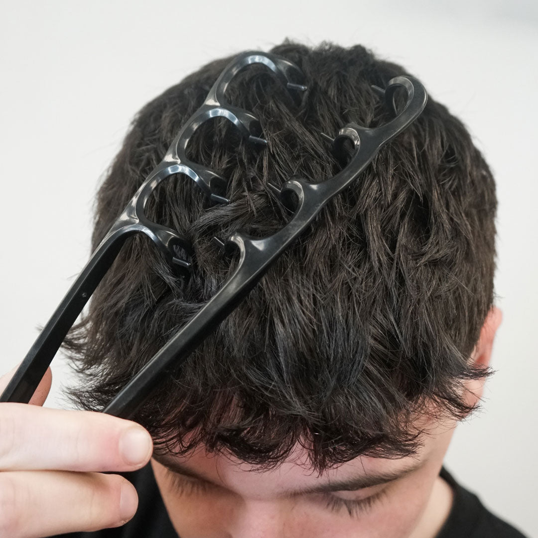 Texture comb being used on hair